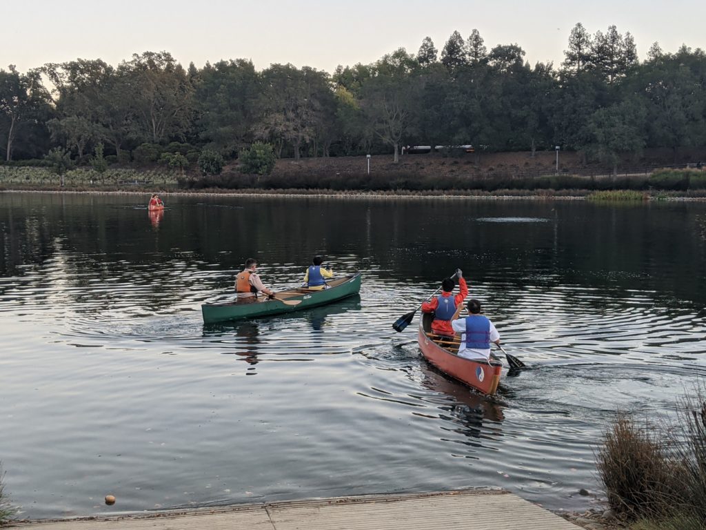 Scouts canoeing on a lake